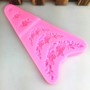 Pink silicone mold featuring 3D rose bouquet patterns for DIY cake fondant and baking crafts