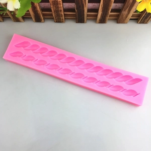 Pink silicone fondant mold with rope and chain patterns for cake border decoration