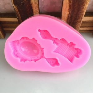 Pink silicone mold featuring vintage mirror and comb shapes for DIY fondant or resin art