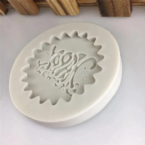 Round Happy Birthday silicone mold with scalloped edges for chocolate and fondant cake art