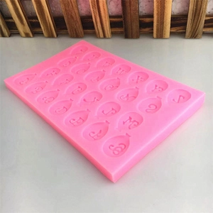 Pink silicone balloon mold featuring numbers and uppercase letters for cake decorating