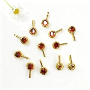 Golden round pendants with red cubic zirconia and beaded edge for DIY jewelry