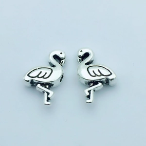 Pair of vintage alloy flamingo animal connector pendants for DIY jewelry making