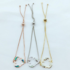Detailed view of adjustable dolphin opal bracelets in rose gold, silver, and gold finishes