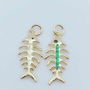 Gold plated copper fishbone pendants with opal inlay and black diamond eye accents