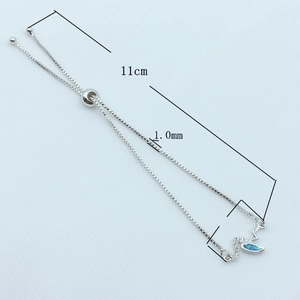 Bracelet ajustable cygne avec opale bleue et zircons cubiques plaqué argent brillant