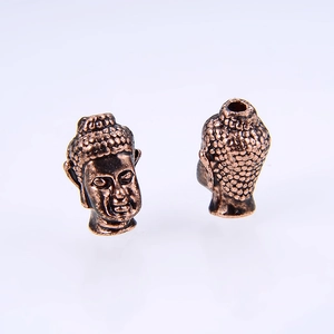Detailaufnahme von Buddha-Kopf-Zwischenperlen aus Bronzelegierung für DIY-Schmuck