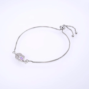 Detail of adjustable silver leaf bracelet with purple opal and micro-set cubic zirconia