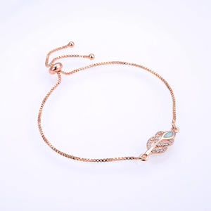 Rose gold leaf bracelet with white opal and cubic zirconia on adjustable box chain