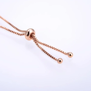 Rose gold adjustable box chain bracelet with sliding ball clasp and polished metal finish