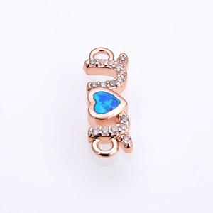 Rose gold heart pendant with blue opal and sparkling cubic zirconia stones