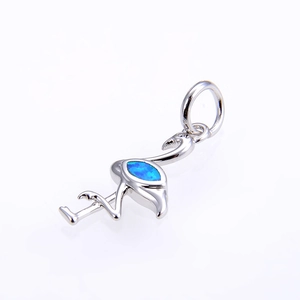 Polished silver flamingo pendant with vibrant blue opal inlay for necklaces and bracelets