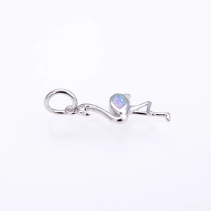 Elegant flamingo pendant with shimmering opal stone inlay in polished silver finish