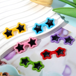 Mini star-shaped doll sunglasses in six vibrant colors for plush toys and pets