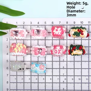 Correa de perlas coloridas DIY para móvil con diseños de flores y corazones, estilo 2026