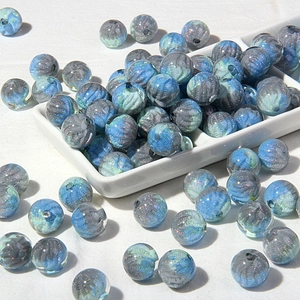 Detailed view of spiral texture ice blue acrylic beads with glitter for DIY jewelry making