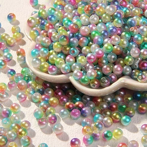 Vue macro de perles ABS irisées multicolores de 6 mm pour la création de bijoux DIY