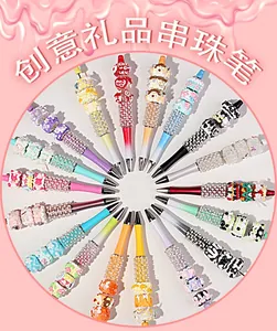Detailed overhead view of various DIY creative beaded pens in a colorful radial arrangement