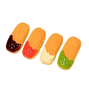 Realistic resin biscuit charms in chocolate, strawberry, cream, and matcha colors on white background