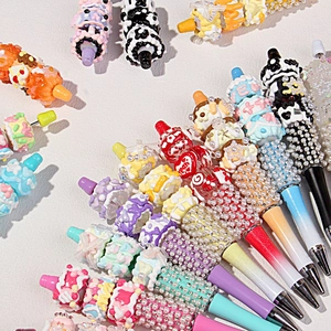 Creative DIY beaded pens with decoden cream and colorful resin charms for gifts
