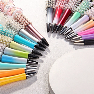 Creative DIY beaded pens with metallic finishes and elegant pearl rhinestone decorations