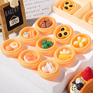 Miniature resin Chinese breakfast dim sum set with steamed buns and dumplings in tiny steamers