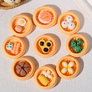 Detailed macro view of 9 different miniature resin Chinese breakfast dim sum models in steamers