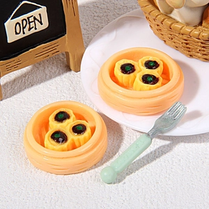 Miniature resin dim sum set with steamed shaomai dumplings and tiny serving fork