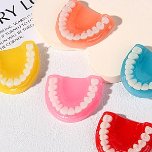 Colorful resin tooth and gum charms in five bright colors for DIY jewelry and parties