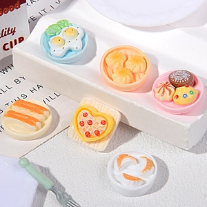 Miniature resin Chinese breakfast food models including baozi and dumplings on a white stand