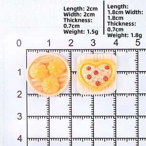 Miniature resin baozi and dessert charms shown with measurements for size scale