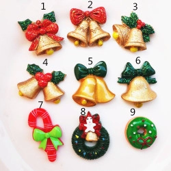 Detailed grid view of assorted Christmas resin charms including wreaths and candy canes