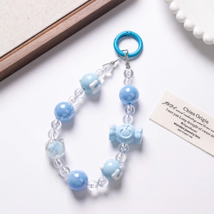 Blue candy-colored beaded keychain with rabbit charm and acrylic stars for bags