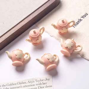 Five miniature pink resin teapots with 3D flower carvings for DIY dollhouse accessories