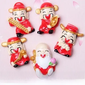 Detailed view of five mini 3D resin God of Wealth figurines for DIY New Year decor