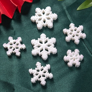 White resin snowflake DIY accessories with pink glitter for Christmas decor and crafts