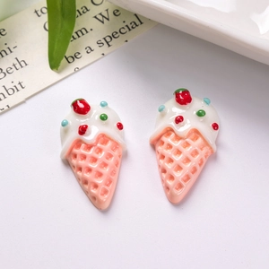 Detailed macro view of resin ice cream cone charms for DIY crafts and accessories