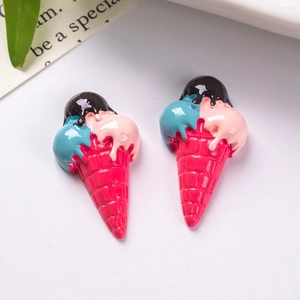 Detailed close-up of resin ice cream cone charms for DIY crafts and accessories