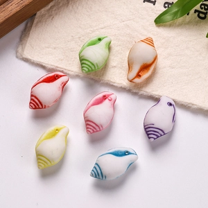Macro shot of colorful spiral seashell beads in various colors for DIY jewelry making