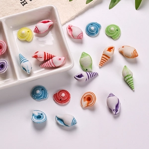 Detailed view of colorful acrylic ocean shell beads with vintage wash for DIY jewelry