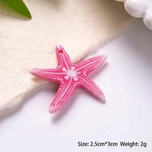 Detail shot of a 2.5cm pink acrylic starfish bead for DIY bracelets and necklaces