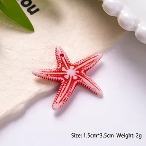 Detail of starfish shaped bead with red mottled pattern for DIY jewelry making