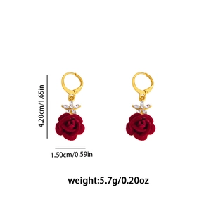 Detailed view of red velvet rose earrings with dimensions 4.20cm height and 1.50cm width