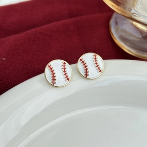 Pair of baseball-shaped stud earrings with red stitching and elegant gold metal trim