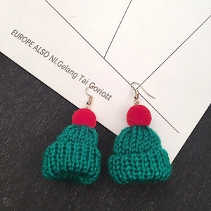 Handmade Christmas hat pendant earrings with green knit texture and red pompom details