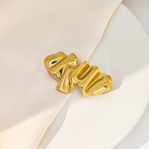Golden irregular pleated metal brooch with a high-gloss mirror finish for elegant styling