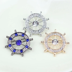 Vintage alloy ship wheel brooches with sparkling crystals in silver gold and grey colors