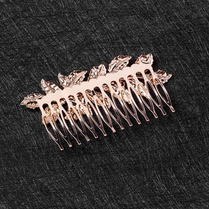 Elegant rose gold leaf hair comb with detailed veins and ten-tooth design for styling