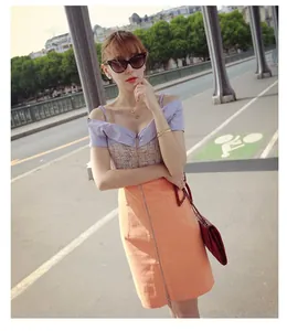 Fashionable purple off-shoulder top paired with an orange high-waisted zip skirt