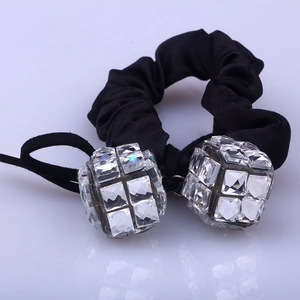 Elegant black pleated hair scrunchie featuring two sparkling faceted crystal cubes